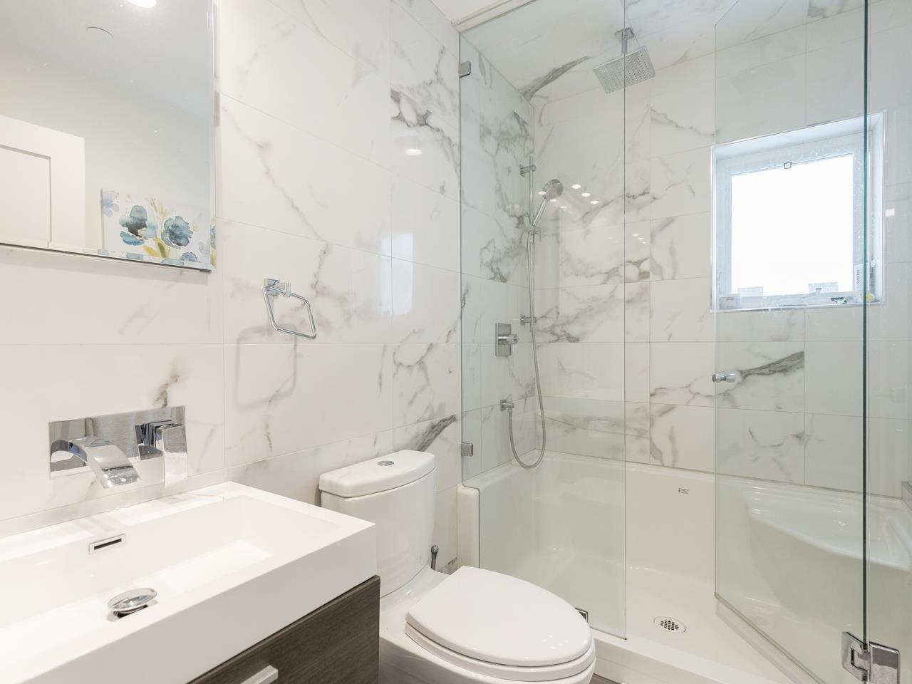 This is a semi ensuite for the master bedroom. Connects through laundry area and is finished to highest standard with huge walk-in shower and beautiful tiled surrounds.