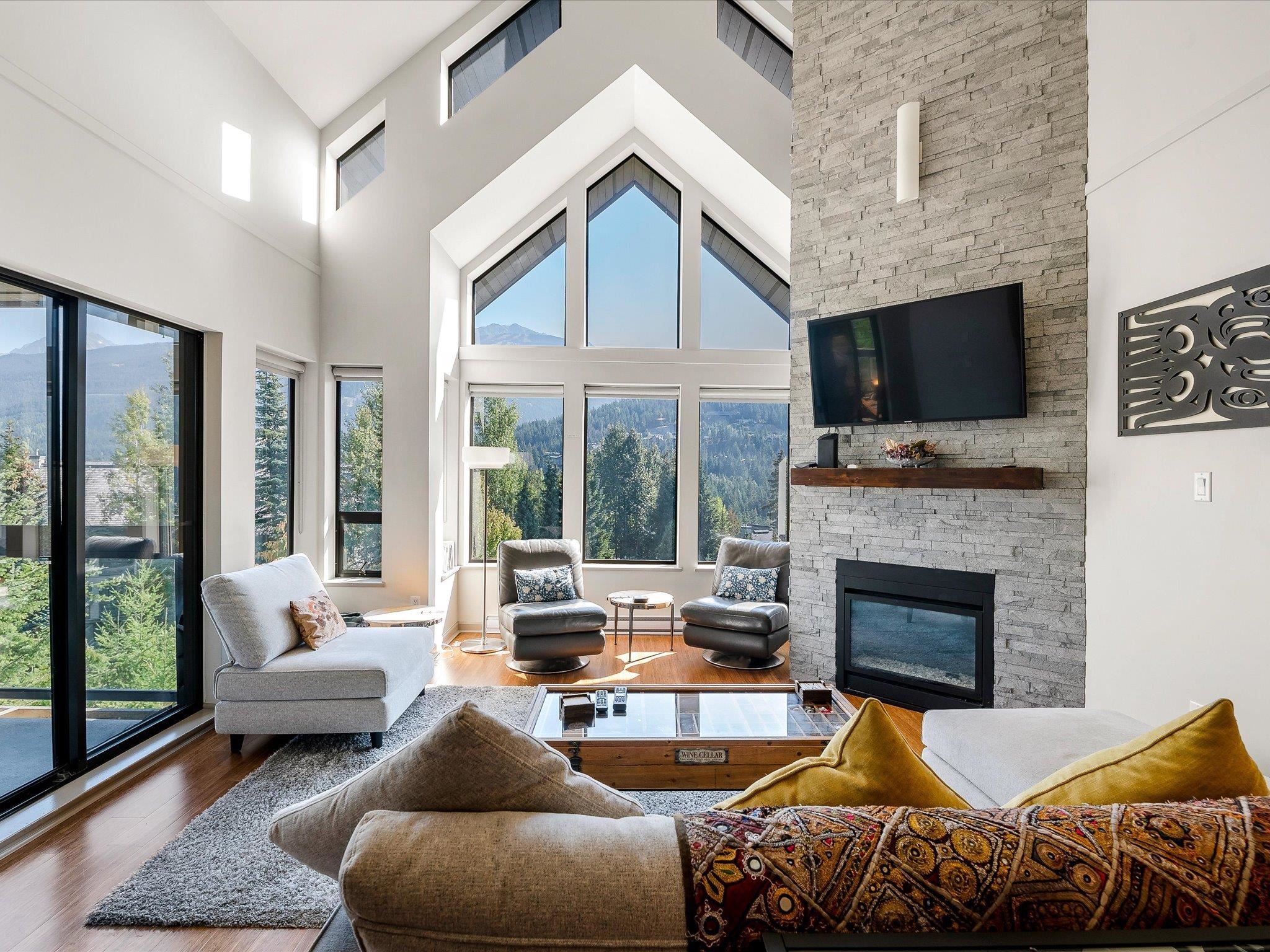 Vaulted ceilings and incredible views! Gas fireplace and new hearth.