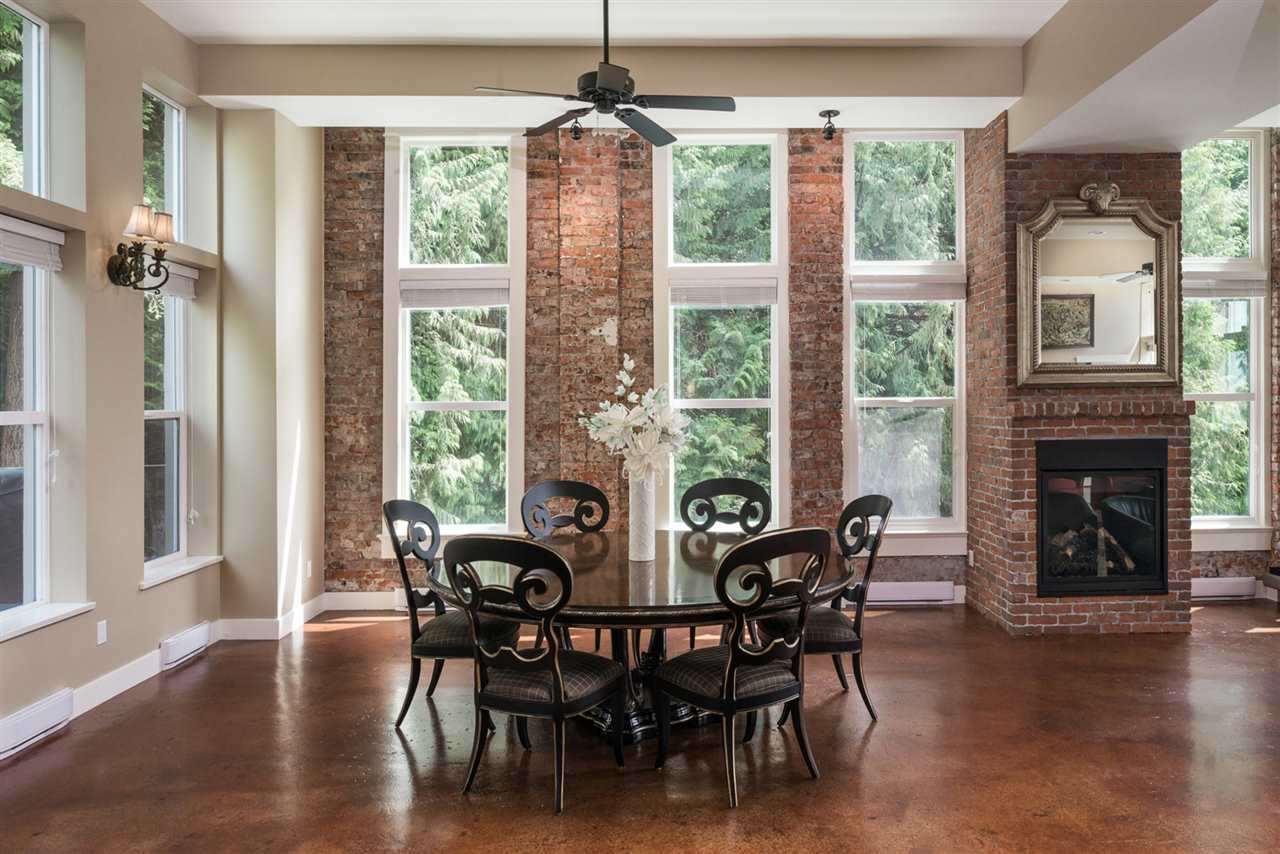 Large open concept floor with living room, dining room, and kitchen area leading out to two large decks on the east and west side of the home.  Perfect for entertaining.