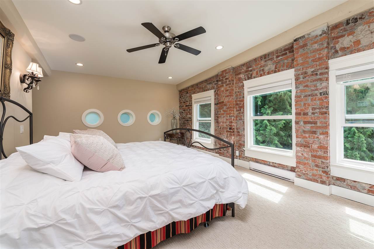 Large master suite with his and hers walk in closets and master bathroom which includes a steam shower, heated, jetted cast iron jacuzzi tub, and bidet.