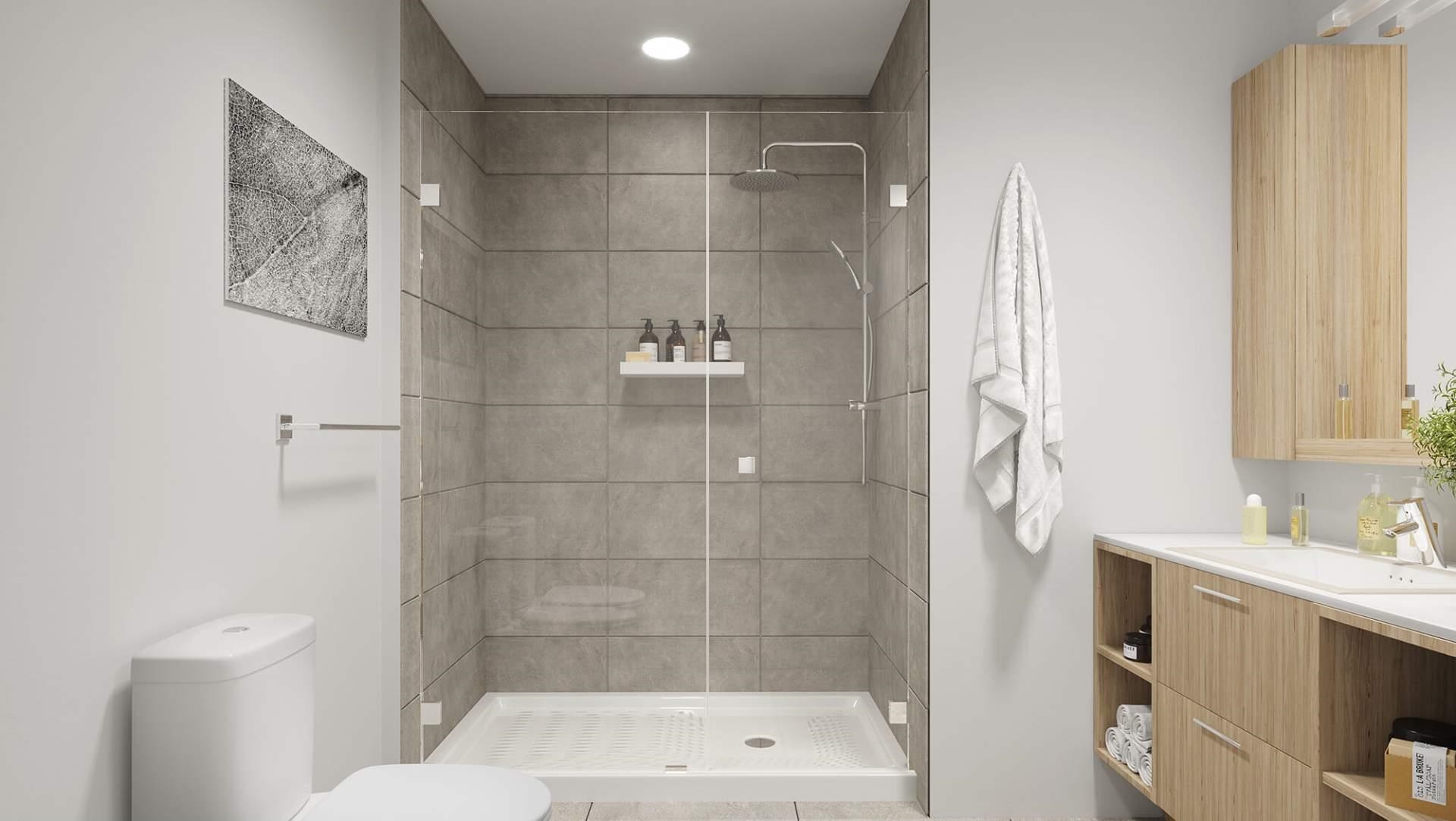 BEAUTIFUL BATHROOMS  Custom floating-look vanity with storage underneath  Modern oversized subway tile in main baths  Chrome Hans Grohe fixtures  Sleek undermounted porcelain sink  Dual flush toilets for improved water consumption