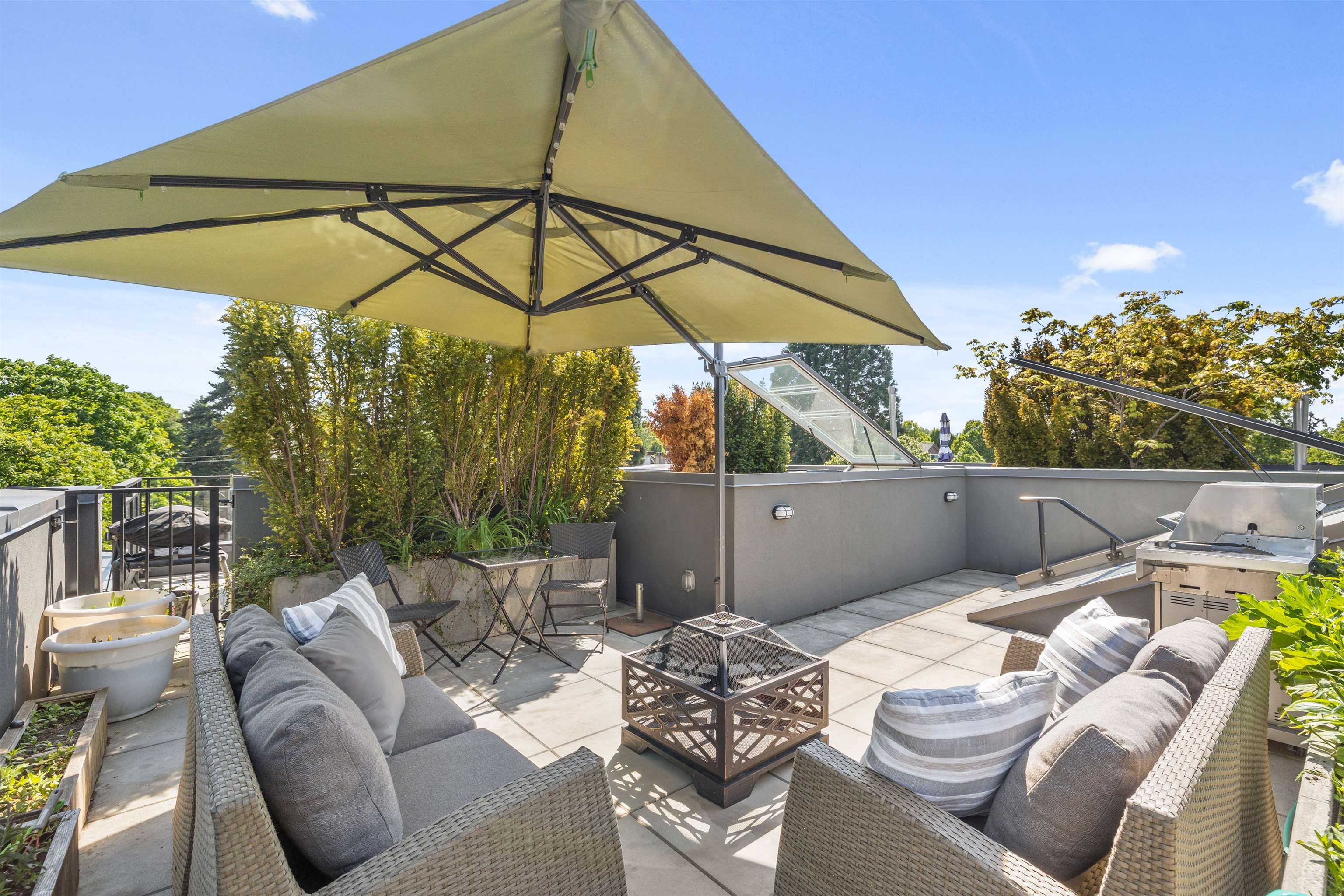 Panoramic views on your private rooftop, with gas hook-up & water access!