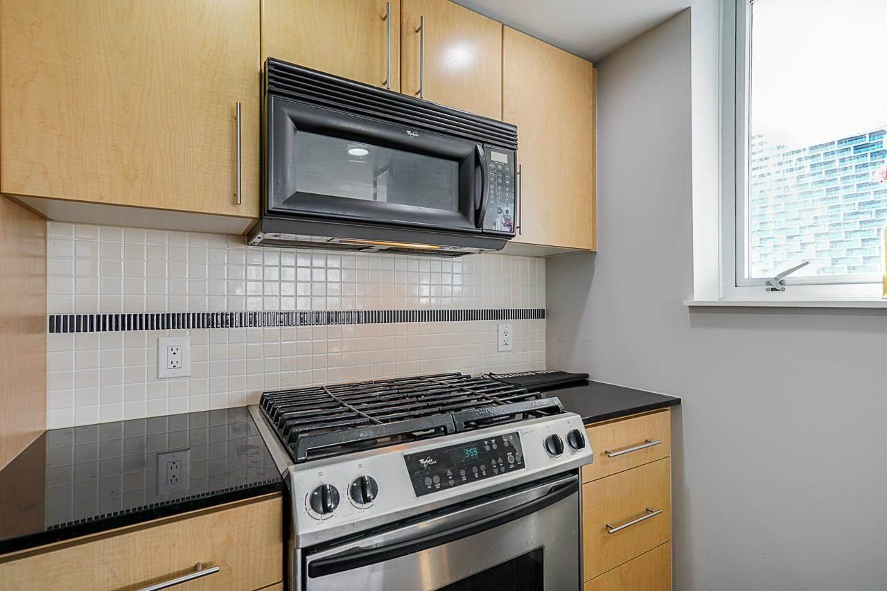 Features a window, stainless steel appliances and gas range!
