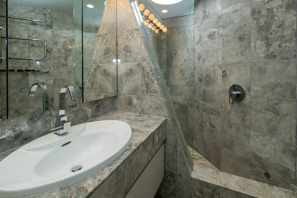 Bathroom with a skylight in the shower stall