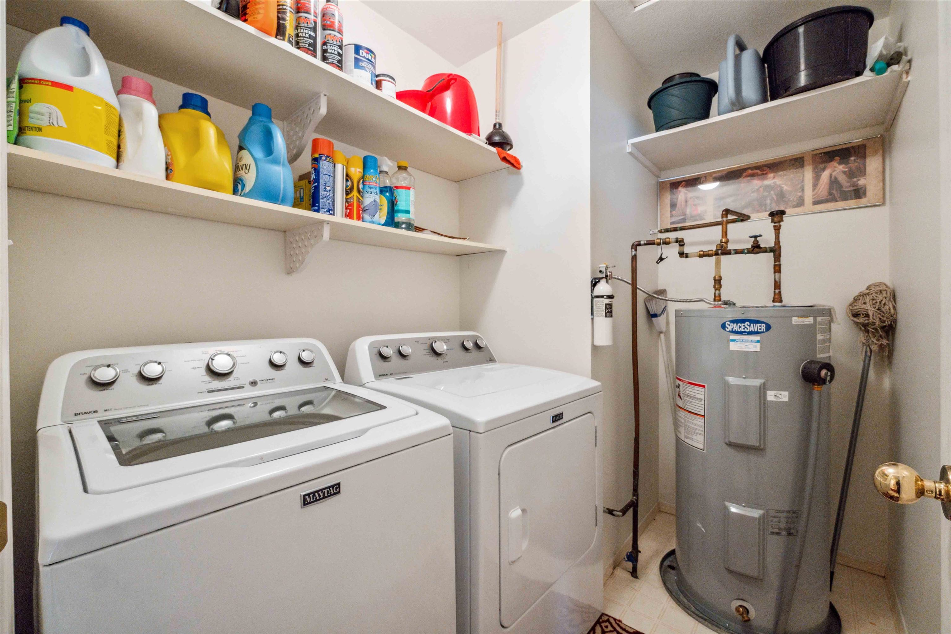 LAUNDRY ROOM WITH LOTS OF EXTRA SPACE