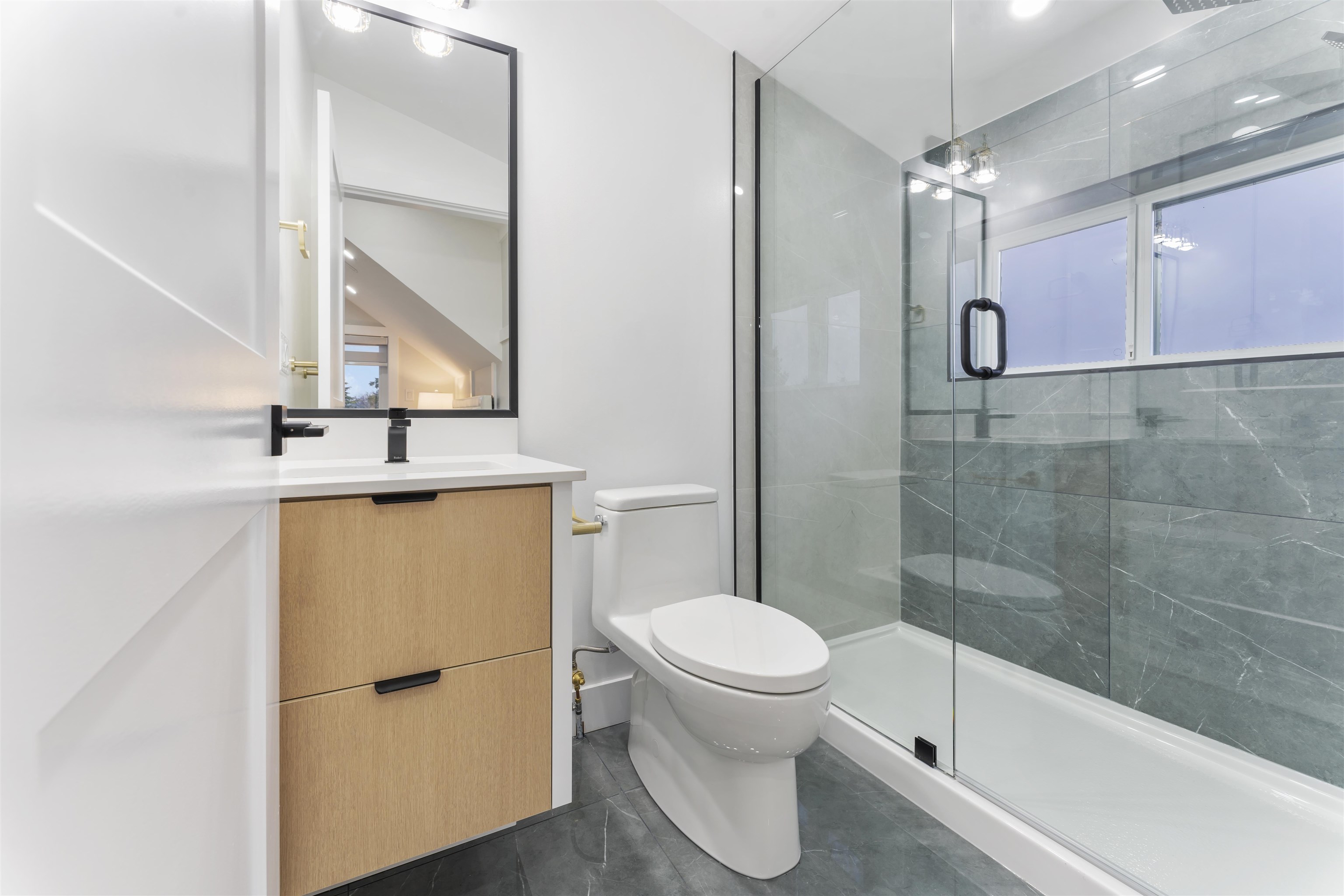 Master Bathroom with beautiful fixtures and also have complete view of Downtown Vancouver