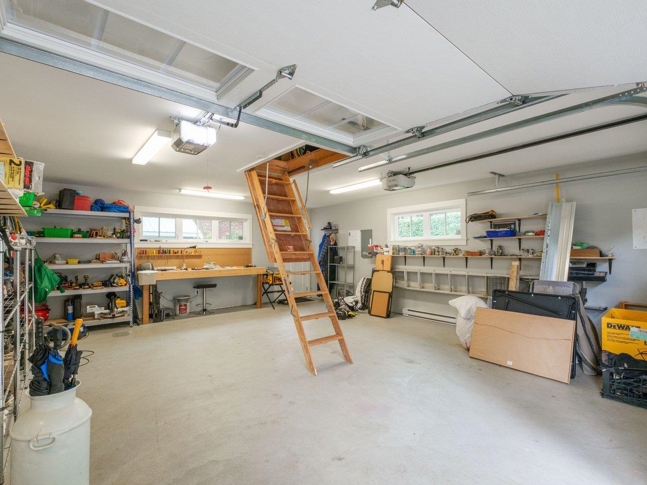 Large garage with lots of easy access attic space totalling some 284 sq.ft.!