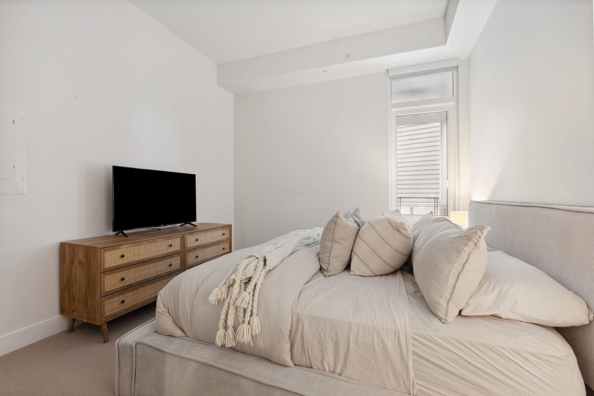 Listing image of 203 6693 NELSON AVENUE