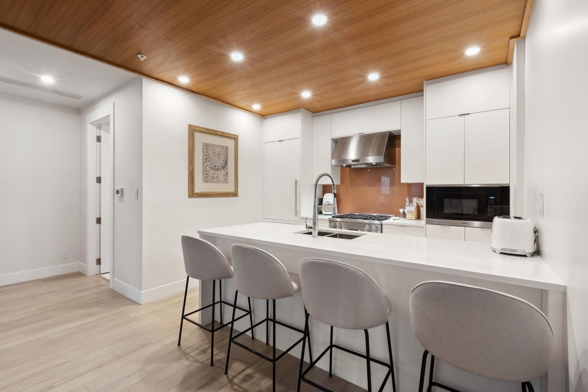 Listing image of 203 6693 NELSON AVENUE