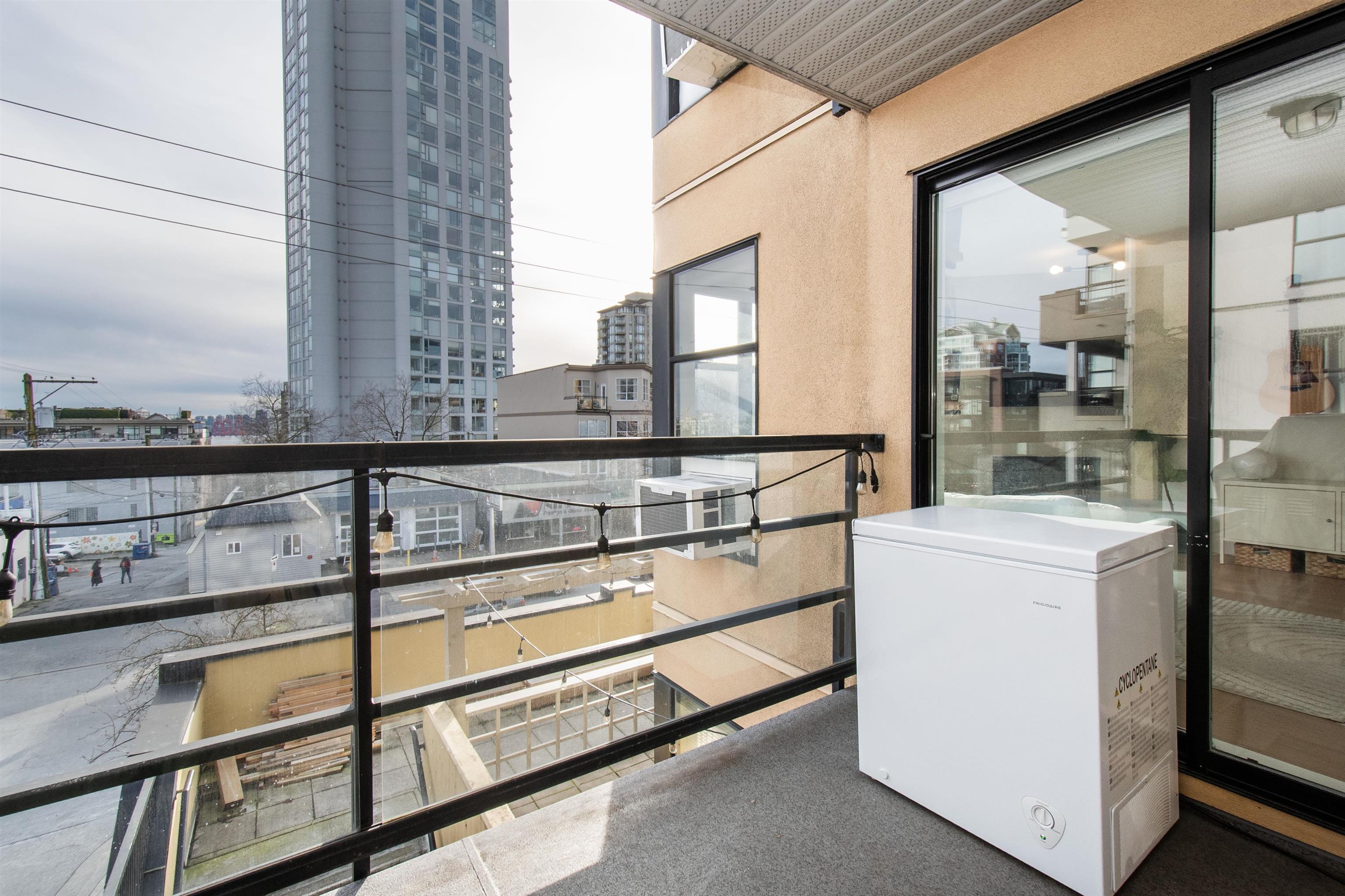 Listing image of 303 124 W 3RD STREET